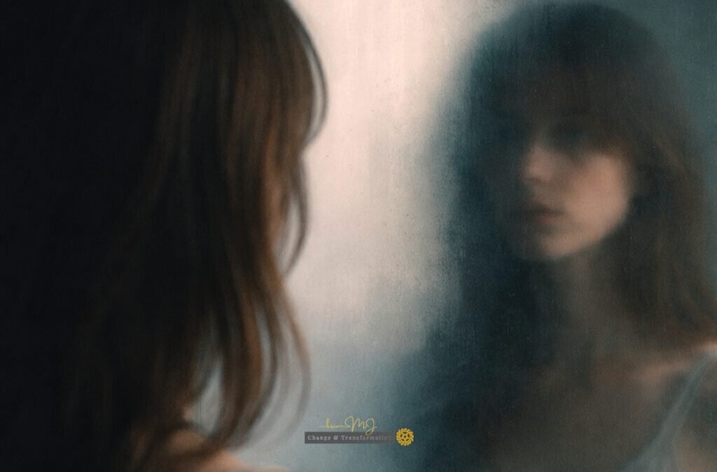 Blurred reflection of a woman looking into a mirror